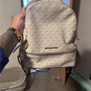 Michael Kors Cream Monogram Backpack with Gold Details